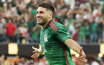 epa10750730 Santiago Gimenez of Mexico (C) reacts after scoring during the second half of the CONCACAF Gold Cup final soccer match between Mexico and Panama at SoFi Stadium in Los Angeles, California, USA, 16 July 2023.  EPA/CAROLINE BREHMAN