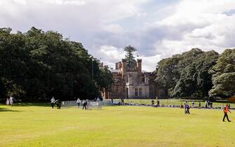 SYDNEY, AUSTRALIA - SEPTEMBER 10: A general view of Government House where floral tributes are laid for Queen Elizabeth II  on September 10, 2022 in Sydney, Australia. Queen Elizabeth II died at Balmoral Castle in Scotland aged 96 on September 8, 2022, and is survived by her four children, Charles, Prince of Wales, Anne, Princess Royal, Andrew, Duke Of York and Edward, Duke of Wessex. Elizabeth Alexandra Mary Windsor was born in Bruton Street, Mayfair, London on 21 April 1926. She married Prince Philip in 1947 and acceded the throne of the United Kingdom and Commonwealth on 6 February 1952 after the death of her Father, King George VI. Queen Elizabeth II was the United Kingdom's longest-serving monarch. (Photo by Jenny Evans/Getty Images)