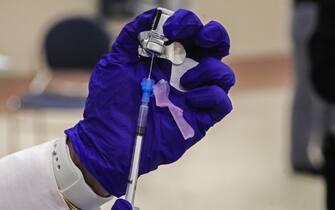 USA HEALTH COOK COUNTY BEGINS COVID-19 VACCINATIONS