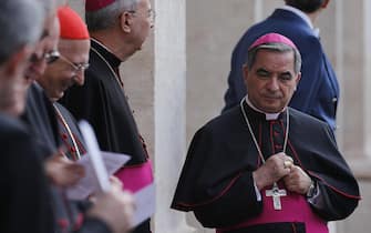 Msgr. Angelo Becciu (R), substitute for General Affairs of the Secretariat of State of the Vatican, is seen in the courtyard of the Quirinale palace in Rome, Italy, 14 November 2013. Pope Francis arrived at the Quirinale palace in Rome on Thursday to pay his first official visit to Italian President Giorgio Napolitano. ANSA/ALESSANDRO DI MEO
