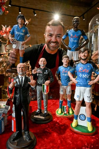 The terracotta statuettes of the Napoli players make up the 'blue nativity scene' created for the upcoming ''Scudetto party'' by the craftsman of San Gregorio Armeno Genny Di Virgilio, in Naples, Italy, 28 April 2023. SSC Napoli lead the Serie A, continuing their seemingly unstoppable march towards the title. ANSA / CIRO FUSCO