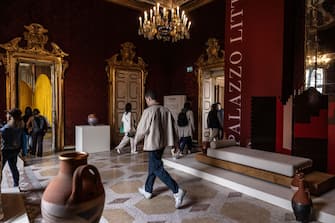 MILAN, ITALY - APRIL 15: A man walks past furnitures on display, part of the "Chelebi. Room of Azerbaijan" exhibition at Palazzo Litta, during the Milan Design Week 2024 on April 15, 2024 in Milan, Italy. Every year, the Salone Internazionale del Mobile and Fuorisalone define the Milan Design Week, the worldâ  s largest annual furniture and design event. Centered on principles of circular economy, reuse, and sustainable practices and materials, the Fuorisaloneâ  s 24 theme:Â â  Materia Naturaâ  , seeks to foster a culture of mindful design. (Photo by Emanuele Cremaschi/Getty Images)