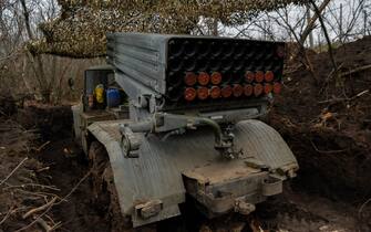 DONETSK REGION, UKRAINE - 2022/12/26: A Ukrainian multiple-launch rocket system is hiding among the trees near Soledar as the fighting in the Donbas region continues. (Photo by Madeleine Kelly/SOPA Images/LightRocket via Getty Images)