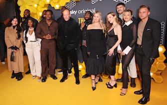 LONDON, ENGLAND - JANUARY 10: Jason Statham (7L) poses with guests including (3L to R) Lala Rae, Abraham Bunga, Harry Aikines-Aryeetey, Paul Olima, Bash The Entertainer, Adrianna Michaels, Alice Johnson-Roach, Luke Catleugh, Ellis Ranson and Carl Cunard attend the UK Premiere of "The Beekeeper" at Vue Leicester Square on January 10, 2024 in London, England. (Photo by Max Cisotti/Dave Benett/WireImage)