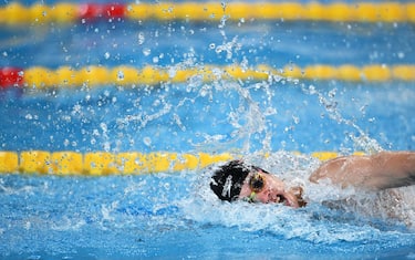 Italy's Alessandro Miressi competes in the final of the men's 4X100m freestyle relay swimming event during the 2024 World Aquatics Championships at Aspire Dome in Doha on February 11, 2024. (Photo by SEBASTIEN BOZON / AFP) (Photo by SEBASTIEN BOZON/AFP via Getty Images)