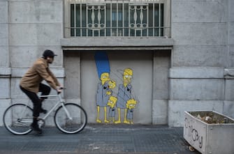 Danneggiato con bombolette spray il murales rappresentante i Simpsons internati nei campi di concentramento sulla fiancata del memoriale della Shoah
Milano, 18 aprile 2023, ANSA/Davide Canella