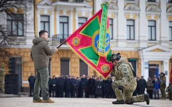 epa10487441 A handout picture made available by the presidential press service shows Ukrainian President Volodymyr Zelensky (L) honouring servicemen at the event 'February, Year, Invincibility' on Sofiivska Square in Kyiv, Ukraine, 24 February 2023 on the first anniversary of the Russian invasion. Russian troops entered Ukrainian territory on 24 February 2022, starting a conflict that has provoked destruction and a humanitarian crisis. One year on, fighting continues in many parts of the country.  EPA/PRESIDENTIAL PRESS SERVICE HANDOUT HANDOUT  HANDOUT EDITORIAL USE ONLY/NO SALES