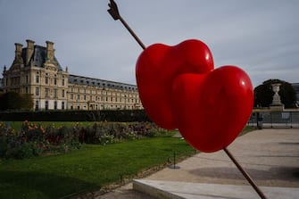 This photograph shows a work by Italian sculptor Gaetano Pesce entitled "Double Heart" on display at the Tuileries Gardens in Paris on October 16, 2023, as part of Paris+ fair by Art Basel. Works of art in public spaces, exceptional auctions, peripheral exhibitions in all directions: the second edition of the modern and contemporary art fair, Paris+, taken over by Art Basel, opens on October 18, 2023 in Paris, on "emergency attack" alert, the highest level of the "Vigipirate" system. (Photo by Dimitar DILKOFF / AFP) / RESTRICTED TO EDITORIAL USE - MANDATORY MENTION OF THE ARTIST UPON PUBLICATION - TO ILLUSTRATE THE EVENT AS SPECIFIED IN THE CAPTION (Photo by DIMITAR DILKOFF/AFP via Getty Images)