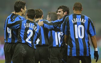 MILAN, Italy:  Inter Milan's forward Ricardo Cruz of Argentina (R) is congratulated by his teammate and midfielder Luis Figo of Portugal (2ndL) after scoring against Palermo during their italian serie A football match at San Siro stadium in Milan, 21 January 2006. AFP PHOTO / GIUSEPPE CACACE ...  (Photo credit should read GIUSEPPE CACACE/AFP via Getty Images)