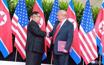 (FILE) - A photo released by the official North Korean Central News Agency (KCNA) shows  Korean leader Kim Jong Un and US President Donald J. Trump (R) during a summit at Sentosa Island, Singapore, 12 June 2018 (reissued 19 January 2019). According to media reports, US President Donald J. Trump and North Korean leader Kim Jong-un are expected to hold a second summit in late February.  ANSA/KCNA   EDITORIAL USE ONLY