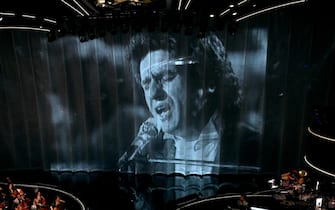 Tribute to Italian singer Toto Cutugno on the screen of the stage at the Ariston theatre during the 74th Sanremo Italian Song Festival, in Sanremo, Italy, 06 February 2024. The music festival will run from 06 to 10 February 2024.  ANSA/ETTORE FERRARI
