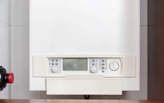 Gas water heater controlling panel or Gas boiler in a home indoor