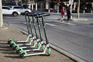 SAN ANTONIO, TEXAS - DECEMBER 11, 2018:  A row of electric rental scooters at a street corner in downtown San Antonio, Texas. (Photo by Robert Alexander/Getty Images)
