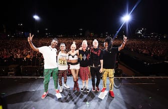 INDIO, CALIFORNIA - APRIL 13: (L-R) Tony Kanal, Gwen Stefani, Adrian Young, and Tom Dumont of No Doubt pose on the Coachella Stage during the 2024 Coachella Valley Music and Arts Festival at Empire Polo Club on April 13, 2024 in Indio, California. (Photo by John Shearer/Getty Images for No Doubt)