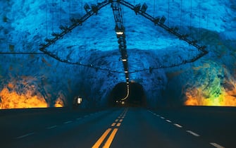 Laerdal Tunnel, Norway. Road On Illuminated Tunnel In Norwegian Mountains. Famous Longest Road Tunnel In World. Popular Place.