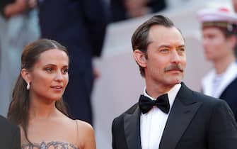 CANNES, FRANCE - MAY 21: Alicia Vikander and Jude Law attend  the "Firebrand (Le Jeu De La Reine)" red carpet during the 76th annual Cannes film festival at Palais des Festivals on May 21, 2023 in Cannes, France. (Photo by Pascal Le Segretain/Getty Images)