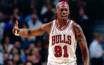 CHICAGO - MARCH 18: Dennis Rodman #91 of the Chicago Bulls reacts  during a game played on March 18, 1997 at the United Center in Chicago, Illinois. NOTE TO USER: User expressly acknowledges and agrees that, by downloading and/or using this photograph, user is consenting to the terms and conditions of the Getty Images License Agreement.  Mandatory Copyright Notice: Copyright 1997 NBAE (Photo by Nathaniel S. Butler/NBAE via Getty Images)