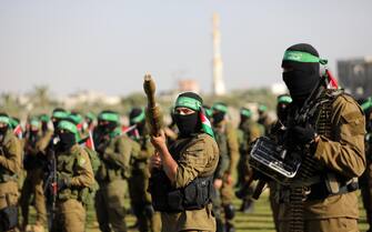 Members of Ezz-Al Din Al-Qassam Brigades, the armed wing of the Palestinian Hamas movement parade in an anti-Israel rally Al-Bureij refugee camp in the central Gaza Strip on May 28, 2021. - The Egyptian-brokered truce ended 11 days of heavy Israeli bombing of Gaza and rocket fire from the impoverished coastal enclave into Israel. Israeli air strikes and artillery fire on Gaza killed 254 Palestinians, including 66 children, and wounded more than 1,900 people in 11 days of conflict from May 10, the health ministry in Gaza says. Rocket and other fire from Gaza claimed 12 lives in Israel, one Indian national and two Thai workers, medics say. Some 357 people in Israel were wounded. Photo by Ashraf Amra//APAIMAGES_APA1327/2105291147/Credit:Ashraf Amra  apaimages/SIPA/2105291152