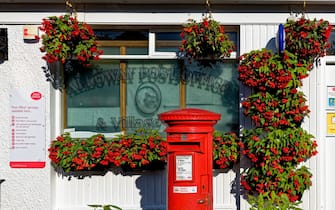 Post Office and Village store near the Robert Burns memorial gardens - birth place of Scottish poet Robert Burns 1759 - 1796, Alloway, South Ayrshire, Scotland. 22nd of July 2021