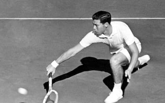 PARIS, FRANCE - MAY 30:  Italian Nicola Pietrangeli returns a backhand to his opponent South African Vermaak during their final at the French Tennis Open in Paris 30 May 1959. Pietrangeli won the French Tennis Open twice in 1959 and 1960.  (Photo credit should read STF/AFP via Getty Images)