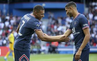Kylian Mbappe of PSG celebrates his goal with Achraf Hakimi of PSG during the French championship Ligue 1 football match between Paris Saint-Germain and Clermont Foot 63 on September 11, 2021 at Parc des Princes stadium in Paris, France