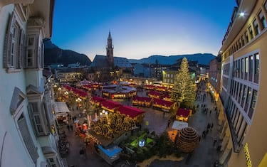 BOLZANO, ITALY - DECEMBER 06:  Locals and tourists visit the Christmas markets on December 6, 2017 in Bolzano, Italy.  (Photo by Simone Padovani/Awakening/Getty Images)