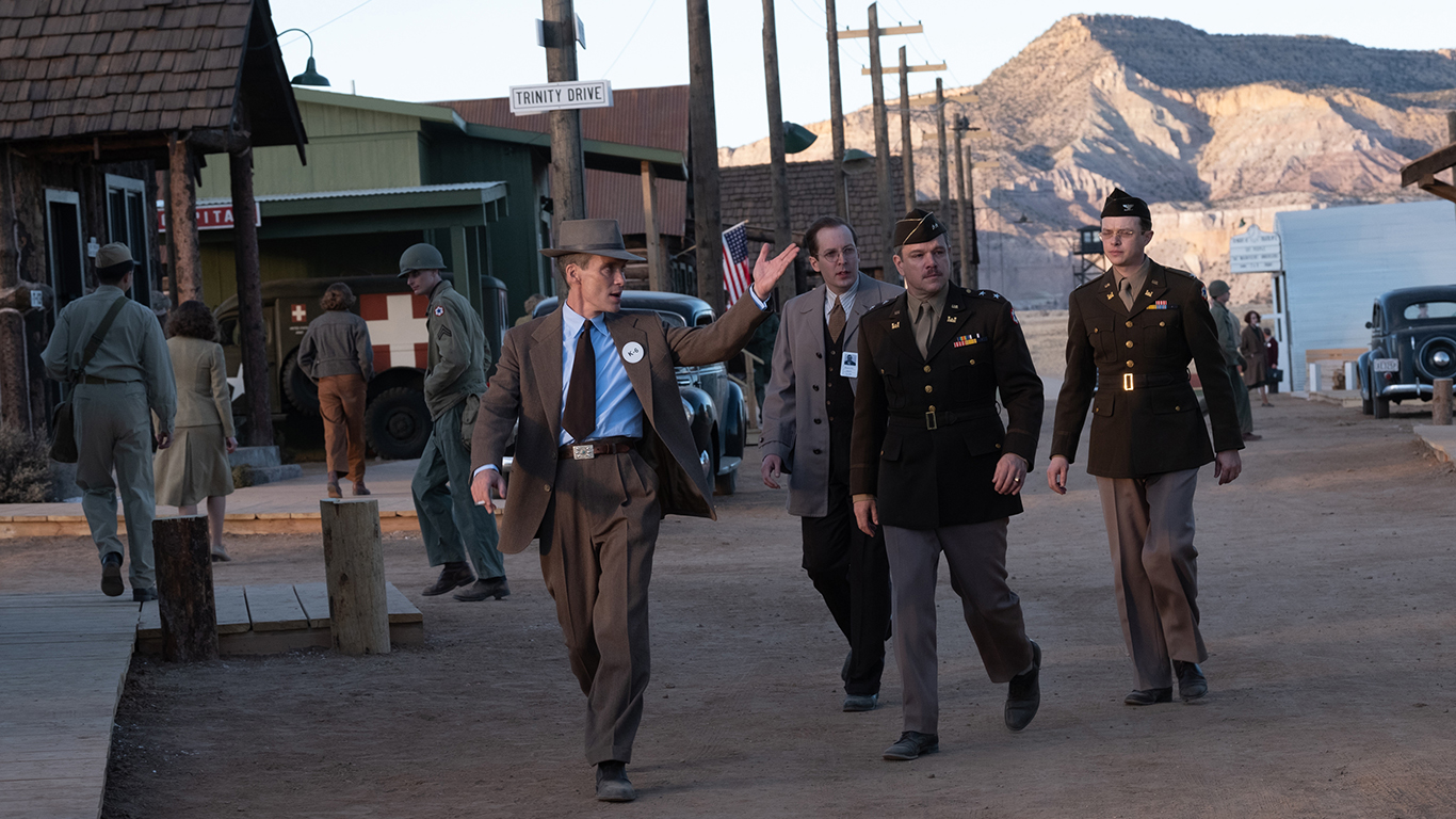 L to R: Cillian Murphy is J. Robert Oppenheimer, Olli Haaskivi is Edward Condon, Matt Damon is Leslie Groves, and Dane Dehaan is Kenneth Nichols in OPPENHEIMER, written, produced, and directed by Christopher Nolan.