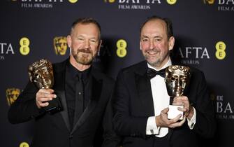 epa11901466 Lee Sandales (L) and Nathan Crowley pose in the press room after winning the Best Production Design award for 'Wicked' during the BAFTA Film Awards at the Royal Festival Hall in London, Britain, 16 February 2025. The ceremony is hosted by the British Academy of Film and Television Arts (BAFTA).  EPA/TOLGA AKMEN
