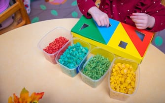 Children Montessori lesson in kindergarden