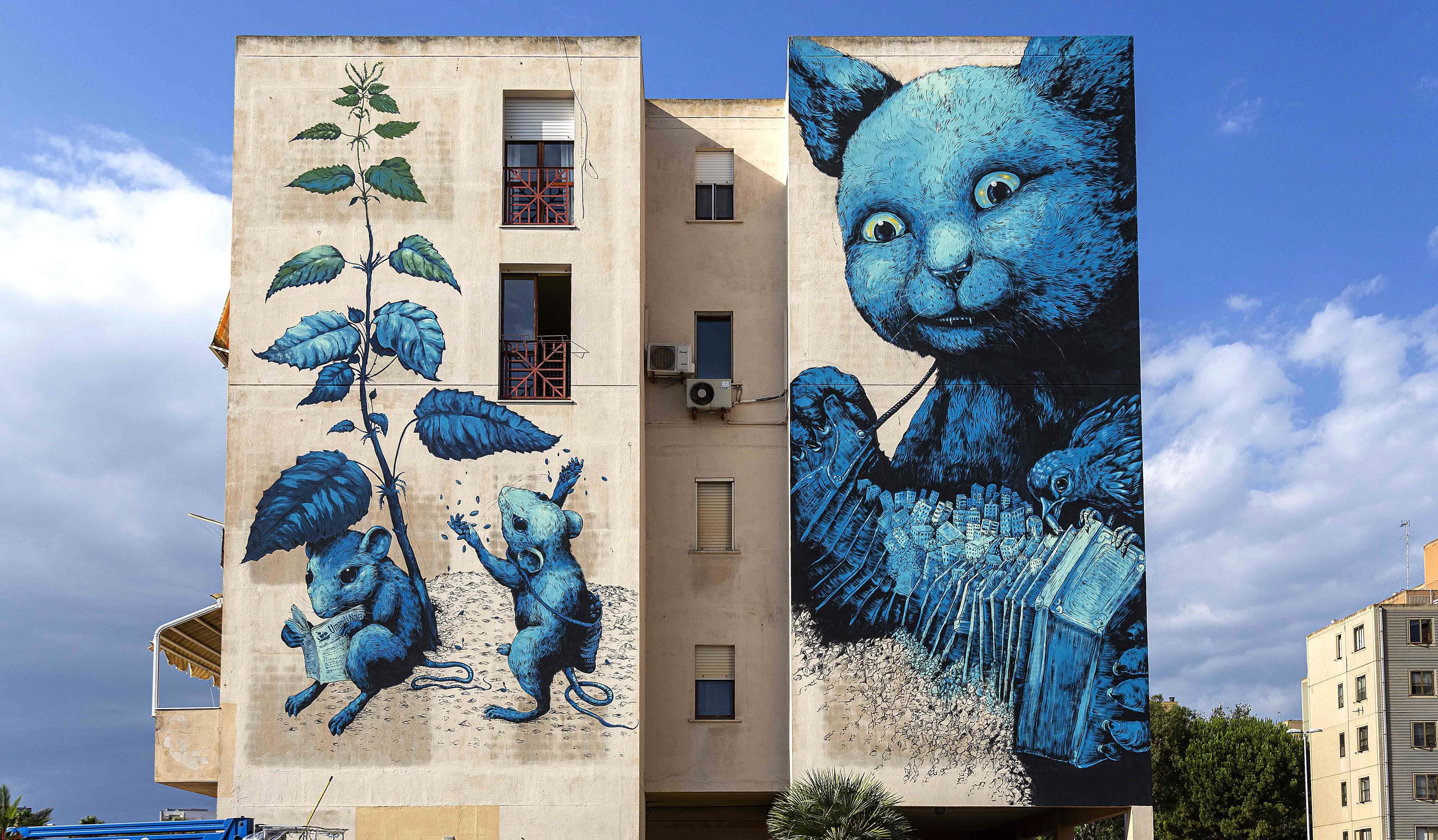 Ericailcane_mural_via_Schiavazzi_Massimiliano_Frau.jpeg