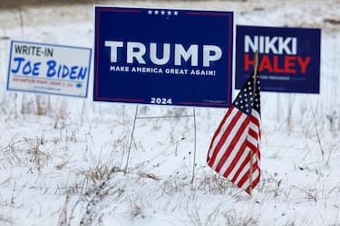 LOUDON, NEW HAMPSHIRE - JANUARY 19: Campaign signs for Republican presidential candidates former President Donald Trump and former UN Ambassador Nikki Haley stand next to a sign asking voters to write in President Joe Biden in next Tuesday's primary election on January 19, 2024 in Loudon, New Hampshire. New Hampshire voters will weigh in next week on the Republican nominating race with their first-in-the-nation primary, about one week after Trump's record-setting win in the Iowa caucuses. Haley is hoping for a strong second-place showing so to continue her campaign into Nevada and South Carolina. (Photo by Chip Somodevilla/Getty Images)