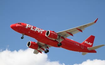 A closeup of the PLAY Airlines Airbus A320 Neo plane in the sky