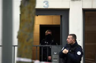 epa11044464 French police stand in front of a building where five bodies were found dead in Meaux, near Paris, France, 26 December 2023. Five bodies, of a mother and her four children were found dead by French police in an apartment on the evening of 25 December. Jean-Baptiste Bladier, the local prosecutor confirmed that a homicide investigation has been launched after the five bodies were found.  EPA/Christophe Petit Tesson