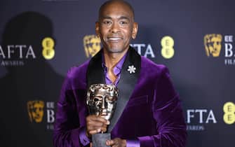 epa11901724 US costume designer Paul Tazewell poses in the press room after winning the Best Costume Design award for 'Wicked' during the BAFTA Film Awards at the Royal Festival Hall in London, Britain, 16 February 2025. The ceremony is hosted by the British Academy of Film and Television Arts (BAFTA).  EPA/TOLGA AKMEN