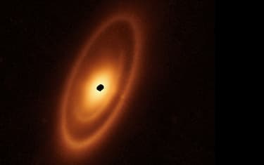 This image of the dusty debris disk surrounding the young star Fomalhaut is from Webb’s Mid-Infrared Instrument (MIRI). It reveals three nested belts extending out to 14 billion miles (23 billion kilometers) from the star. The inner belts – which had never been seen before – were revealed by Webb for the first time.

The Hubble Space Telescope and Herschel Space Observatory, as well as the Atacama Large Millimeter/submillimeter Array (ALMA), have previously taken sharp images of the outermost belt. However, none of them found any structure interior to it.

These belts most likely are carved by the gravitational forces produced by unseen planets.