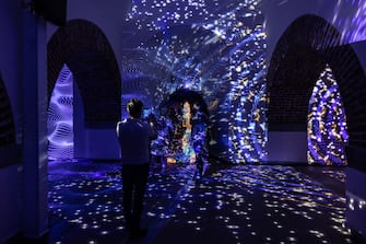 MILAN, ITALY - APRIL 15: Three people visit the exhibition "Transitions" by Starck, located at Castello Sforzesco, during the Milan Design Week 2024 on April 15, 2024 in Milan, Italy. Every year, the Salone Internazionale del Mobile and Fuorisalone define the Milan Design Week, the worldâ  s largest annual furniture and design event. Centered on principles of circular economy, reuse, and sustainable practices and materials, the Fuorisaloneâ  s 24 theme:Â â  Materia Naturaâ  , seeks to foster a culture of mindful design. (Photo by Emanuele Cremaschi/Getty Images)
