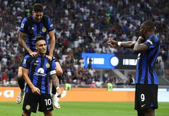 MILAN, ITALY - SEPTEMBER 03: Lautaro Martinez of FC Internazionale celebrates with his team-mates Marcus Thuram and Alessandro Bastoni after scoring the team's second goal during the Serie A TIM match between FC Internazionale and ACF Fiorentina at Stadio Giuseppe Meazza on September 03, 2023 in Milan, Italy. (Photo by Marco Luzzani/Getty Images)