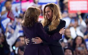 epa11683890 US Vice President and Democratic presidential nominee Kamala Harris (L) embraces American singer Beyonce (R) during a campaign rally at the Shell Energy Stadium in Houston, Texas, USA, 25 October 2024. Harris is running against former US president and Republican presidential nominee Donald Trump and the United States will hold its election on 05 November 2024.  EPA/CARLOS RAMIREZ