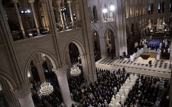 epa11763183 Clerics arrive to attend the reopening ceremony of the Notre Dame de Paris Cathedral in Paris, France 07 December 2024.  Paris  Cathedral took almost 6 years to rebuild after been severely damaged in a devastating  fire that broke out on 15 April 2019.  EPA/CHRISTOPHE PETIT TESSON / POOL