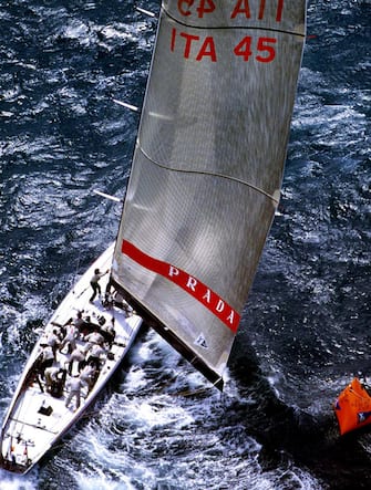 AKL06 - 20000201 - AUCKLAND, NEW ZEALAND : Prada's "Luna Rossa" in catch up mode tacks around the windward mark in pursuit of the Saint Francis Yacht Club's "America One" on race day five of the Louis Vuitton Cup finals in Auckland, 01 February, 2000.  America One won by 34 seconds.  Prada leads the series with three wins to two in the best of nine match finals to determine who goes on to challenge Team New Zealand for the America's Cup on the 19th of February.  
EPA PHOTO/AFP/PHOTOSPORT/DEAN TREML/dt/fl