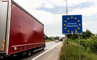 A lorry with goods passes the Lithuanian border sign to enter Lithuania on June 29, 2022 at Polish-Lituanian border on the busy E67 road. The Polish border with Lithuania is situated between Kaliningrad oblast (part of Russia) and Belarus and stretches 100 kilometers. The Area is called Suwalki Gap and is the only connection between Baltic States and the rest of the NATO and European Union. After Lithuania refused to transport sanctioned goods via rail from Russia's mainland to Kaliningrad, Vladimir Putin, Russian president, threatened Lithuania with serious consequences. Both NATO and European Union worry that Suwalki Gap, a relatively narrow corridor with Baltic States can be attacked by Russia (Photo by Dominika Zarzycka/NurPhoto)