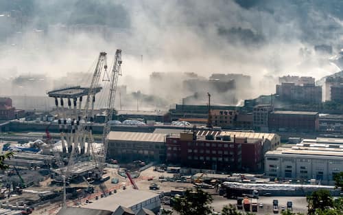 GENOA, ITALY - 2019/06/28: Remains of Morandi bridge are seen after the demolition of eastern pylons. The Morandi viaduct collapsed on August 14, 2018 causing the death of 43 people. (Photo by Nicolò Campo/LightRocket via Getty Images)