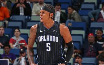 NEW ORLEANS, LA - OCTOBER 10: Paolo Banchero #5 of the Orlando Magic looks on during the game against the New Orleans Pelicans  on October 10, 2023 at the Smoothie King Center in New Orleans, Louisiana. NOTE TO USER: User expressly acknowledges and agrees that, by downloading and or using this Photograph, user is consenting to the terms and conditions of the Getty Images License Agreement. Mandatory Copyright Notice: Copyright 2023 NBAE (Photo by Layne Murdoch Jr./NBAE via Getty Images)