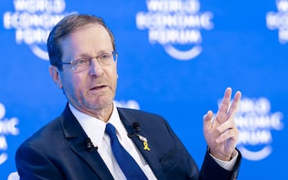 epa11842392 President of Israel Isaac Herzog gestures as he speaks at a plenary session during the 55th annual World Economic Forum (WEF) meeting in Davos, Switzerland, 21 January 2025. The World Economic Forum's annual meeting gathers entrepreneurs, scientists, and corporate and political leaders in Davos from January 20 to 24.   EPA/MICHAEL BUHOLZER