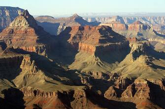 A view into the Grand Canyon from the South Rim 10 July 2003 in Arizona.   More than four million people visit the Grand Canyon every year posing serious logistical and crowd-management challenges for Grand Canyon and National Park Service authorities. AFP PHOTO / Robyn BECK  (Photo credit should read ROBYN BECK/AFP via Getty Images)