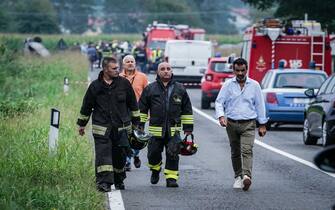 A plane of the acrobatic patrol of the Frecce Tricolori crashed near the airport of Caselle, Turin, Italy, 16 September 2023. The pilot escaped by parachuting while a five-year-old girl died in the crash. The aircraft crashed at the bottom of the track involving, according to the first news, a car.    ANSA / TINO ROMANO