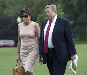 epa06023653 Viktor (R) and Amalija Knavs, the parents of US First Lady Melania Trump, arrive with US President Donald J. Trump and Melania (both not pictured) at the White House in Washington, DC, USA, 11 June 2017, after a trip to New Jersey.  EPA/CHRIS KLEPONIS / POOL