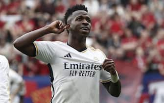 epa11224350 Real Madrid's Vinicius Jr celebrates after scoring the 1-4 goal during the LaLiga soccer match between CA Osasuna and Real Madrid, in Pamplona, northern Spain, 16 March 2024.  EPA/Jesus Diges