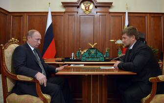 Russian President Vladimir Putin (L) speaks with Head of the Chechen Republic Ramzan Kadyrov during a working meeting in the Kremlin in Moscow, Russia, 04 December 2014. ANSA/ALEXEI DRUZHININ / RIA NOVOSTI / KREMLIN POOL