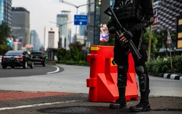 JAKARTA, INDONESIA - APRIL 17 :  Indonesian police officers stand guard during the bikers protest against the Myanmar military coup outside ASEAN secretariat building in  Jakarta, Indonesia, on April 17, 2021. Dozens of Indonesian bikers rallied to support Myanmar activists, after the ASEAN leaders agreement to meet and discuss the situation in Myanmar on 24 April. (Photo credit should read Jepayona Delita/Jefta Images/Future Publishing via Getty Images)